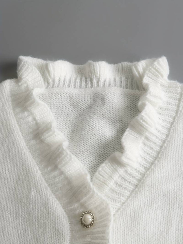 Evie | Plain sweater with V-neck and button